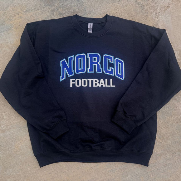 Black sweatshirt with 'NORCO FOOTBALL' text on a beige surface